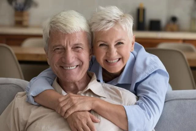 Older couple smiling together