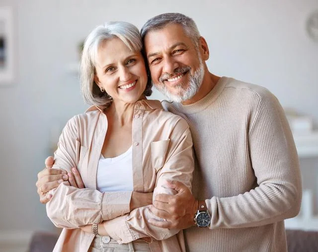 Older couple smiling together