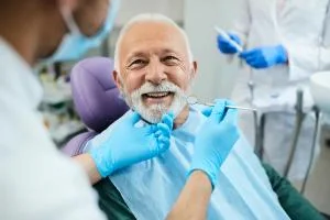 Dentist performing a careful oral examination
